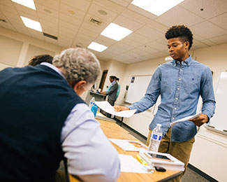 Psychology Student Working with Professor