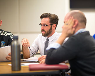 students talking in a class