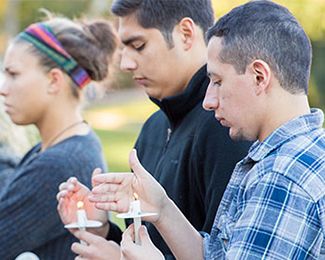 Peace club students at a vigil